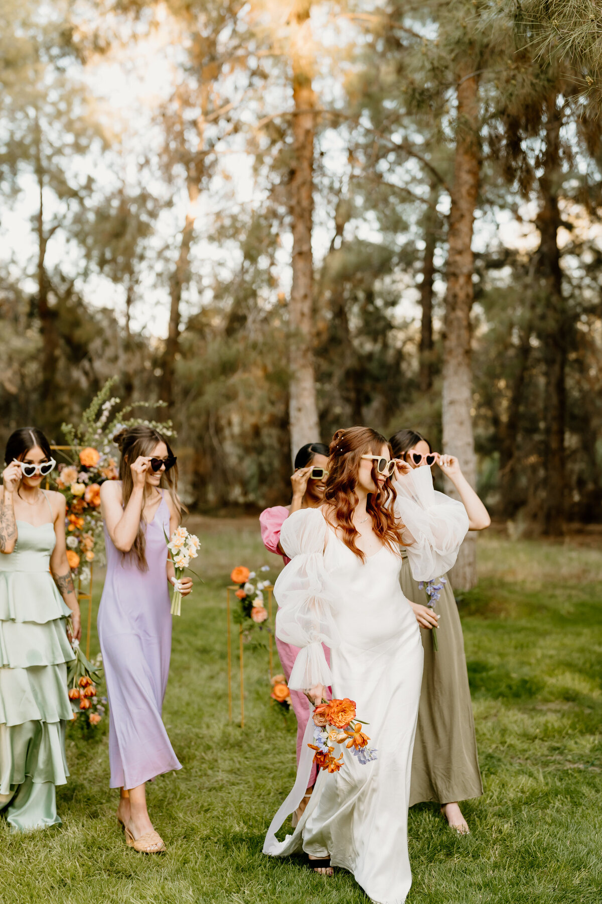bridesmaid and bride walking