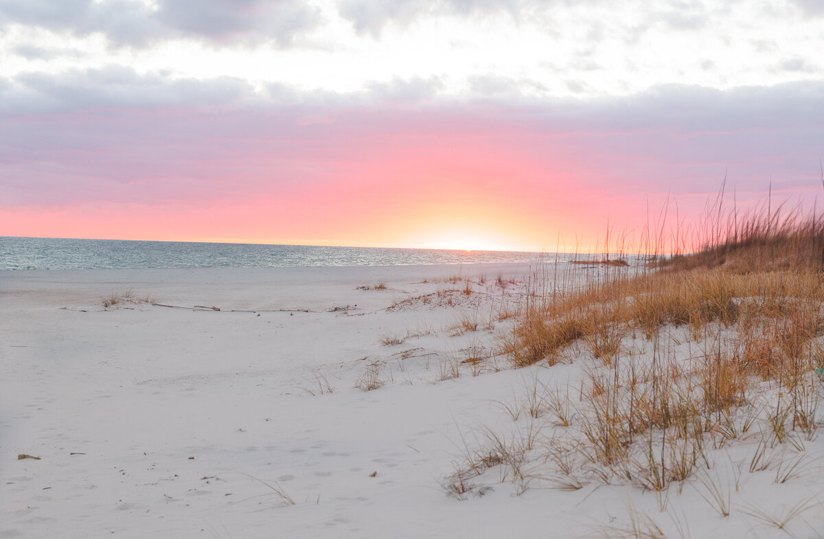 Colorful sunset over the water in Orange Beach 