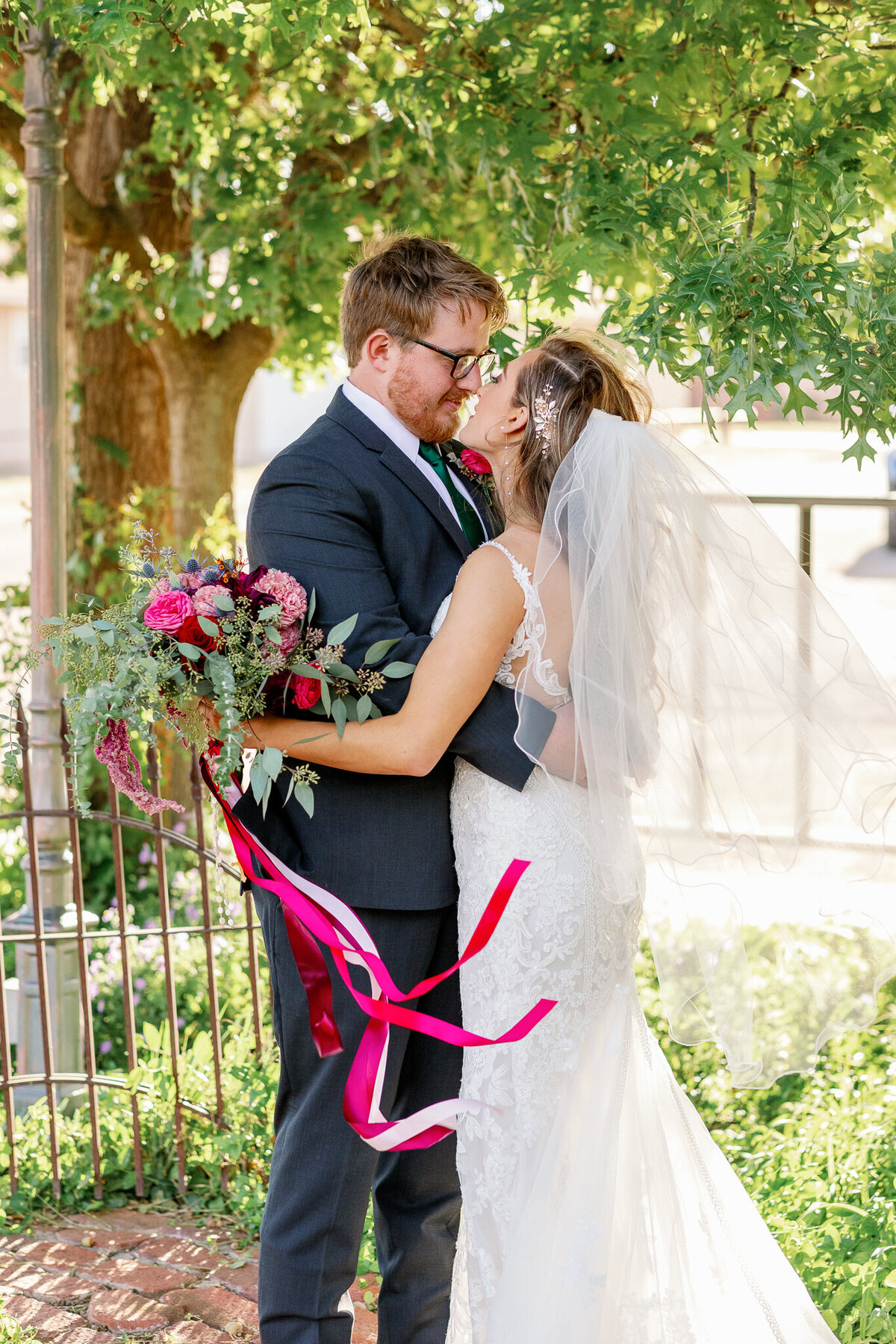 True to life photo of a bride and groom sharing an intimate moment together