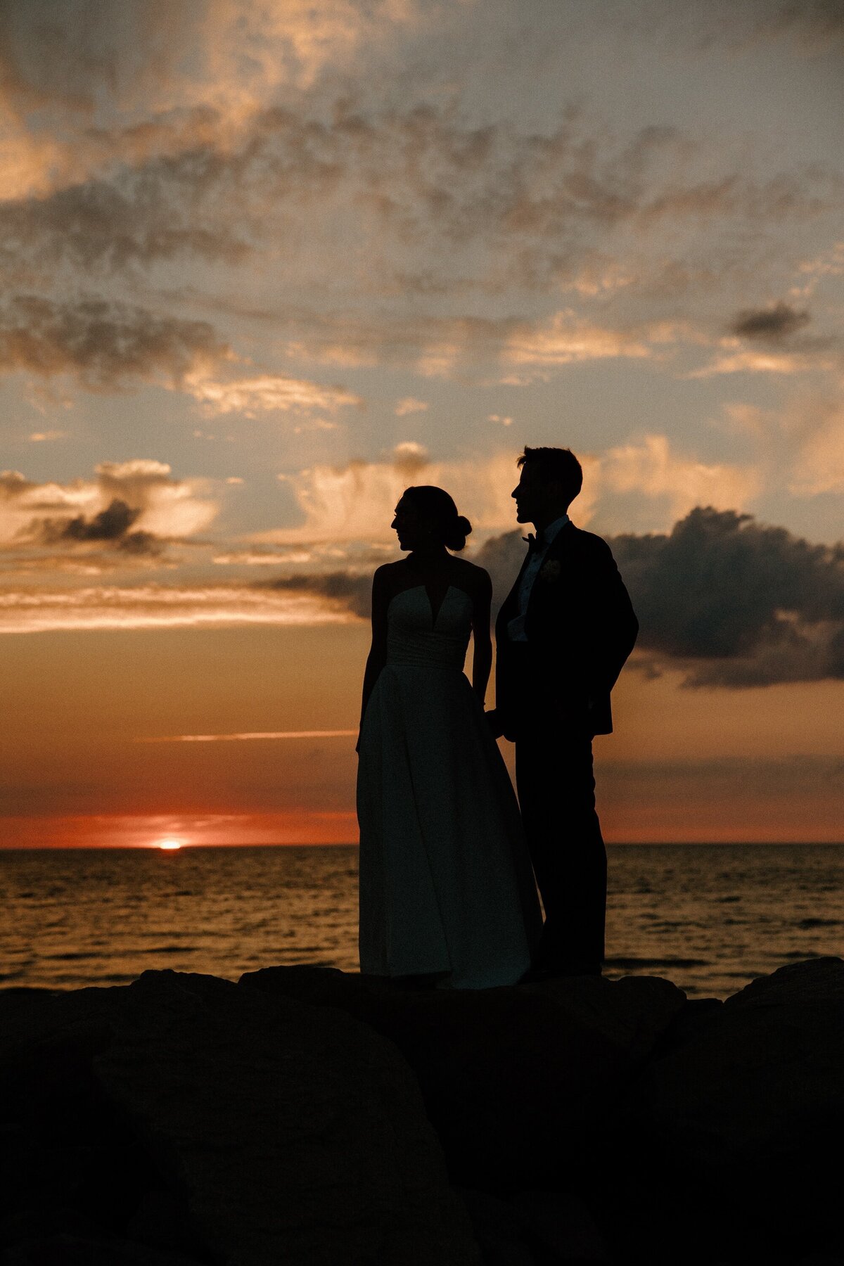 bride and groom on sunset at beach