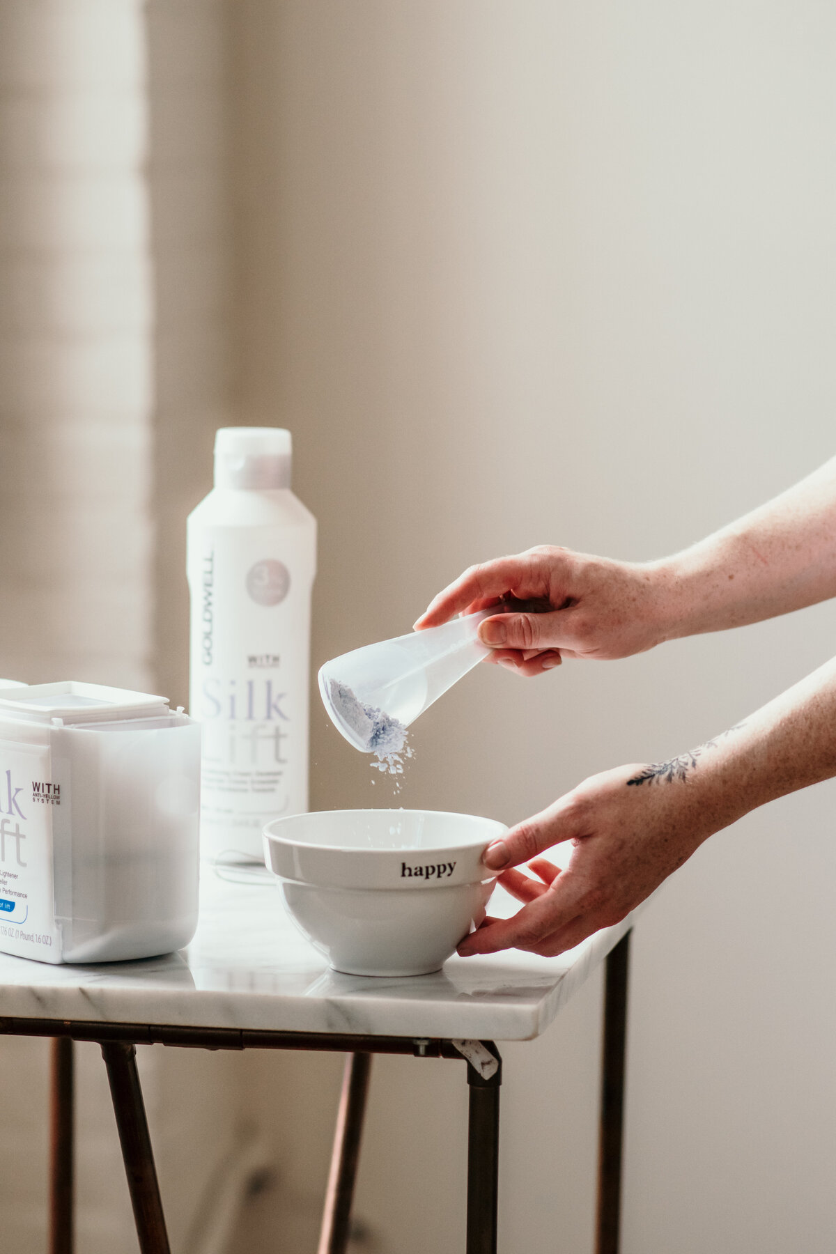 Goldwell Silklift lightener being measured for highlights