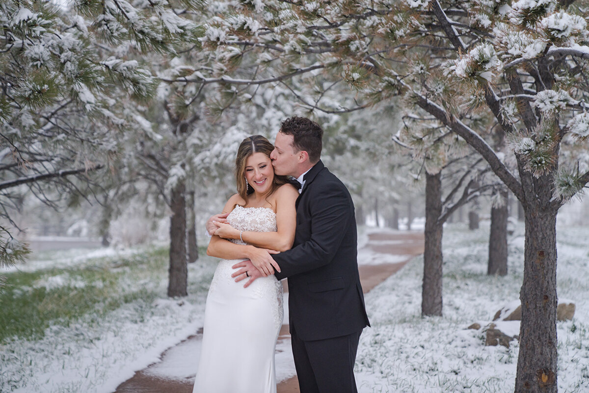 Wedding couple photos in snow Spruce Mountain