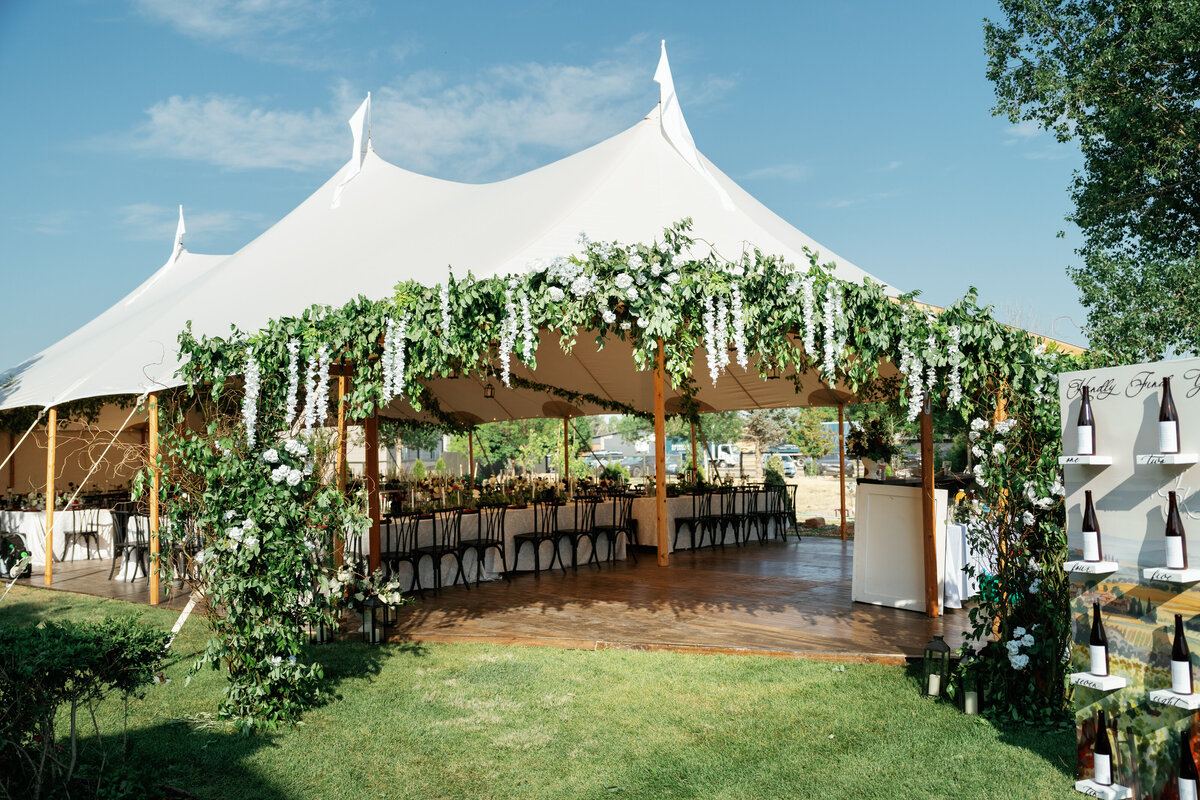 Chairs are set up for a wedding ceremony infront of a lake