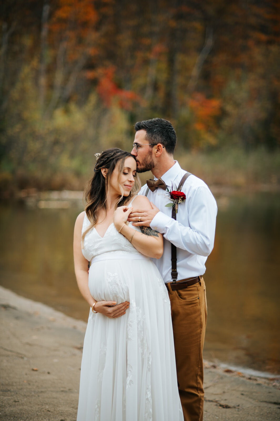 pregnant wedding maternity bride and groom on beach at mountain top inn