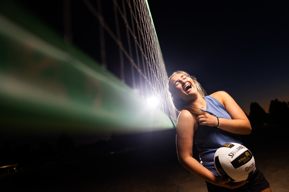 portrait-senior-highschool-laughter-volleyball-sports-spokane