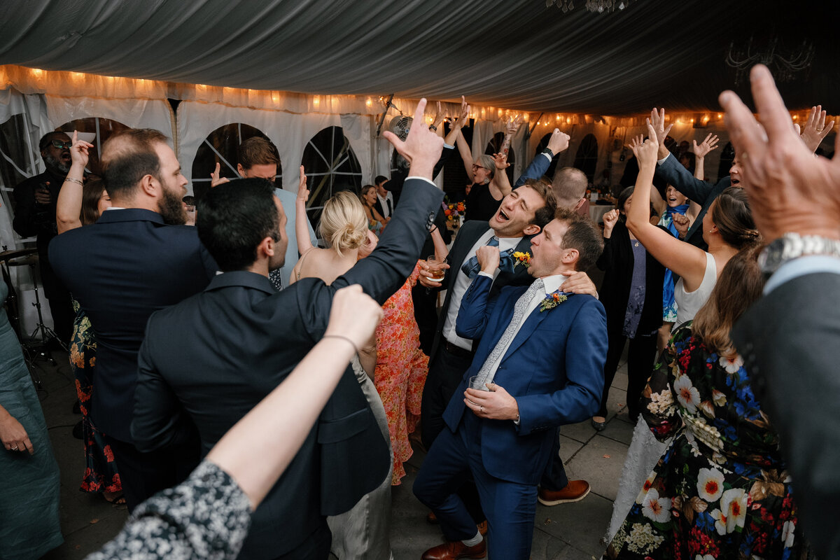 Guests singing at a reception