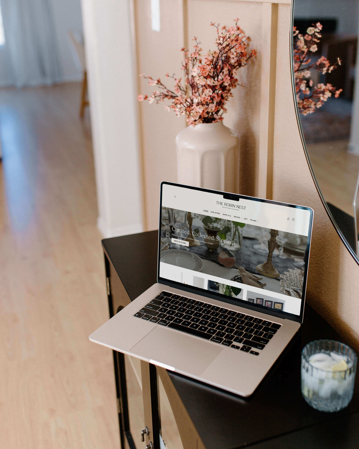 Warm, editorial-style homepage design featuring natural textures and muted tones for a refined artisan home brand.