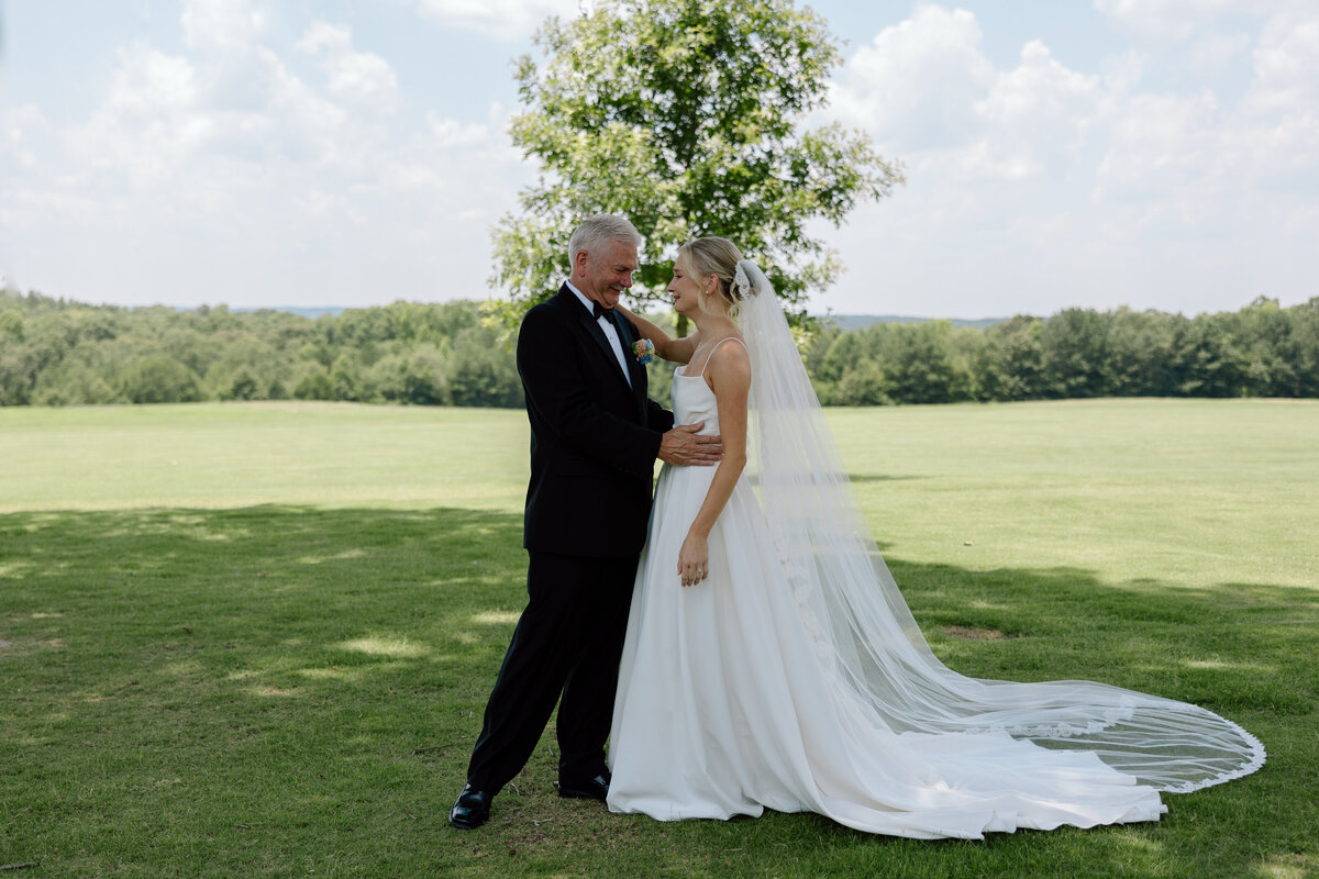Bride and father of the bride first look; father  and daughter crying
