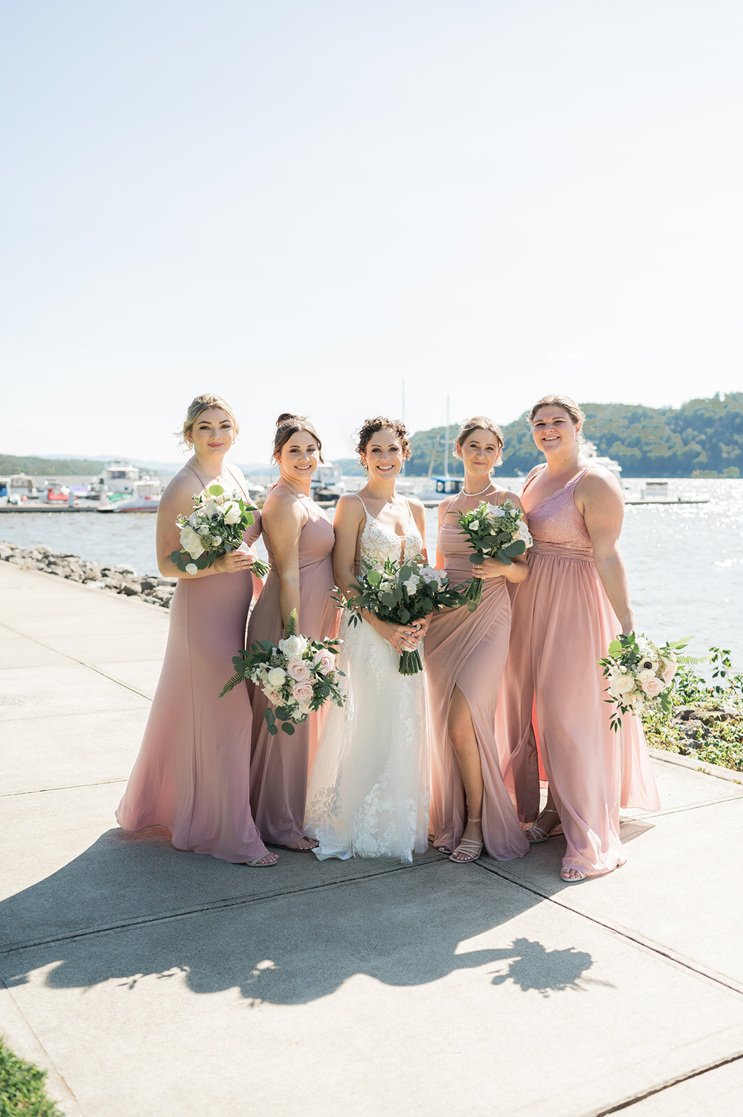 bride and bridesmaids during wedding portraits