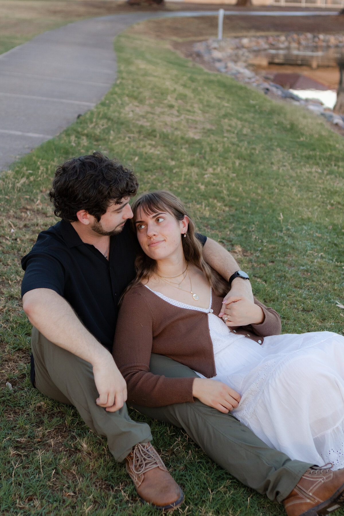 Jovanna G Photography. Classic, sophisticated Wedding Photos. Soft romantic engagement photos. Soft romantic WeddingPhotos. Sophisticated Wedding Photographer. Professional Wedding Photographer. Destination Wedding Photographer. Luxury Wedding photographer. Traveling Wedding Photographer. AZ Wedding Photographer. Gilbert AZ Wedding Photographer. Queen Creek Wedding Photographer. Phoenix Wedding Photographer. Scottsdale Wedding Photographer. Flagstaff Wedding Photographer. SoCal Wedding Photographer. California Wedding Photographer. Northern California Wedding Photographer. Southern California Wedding Photographer. San Francisco Wedding Photographer. Bay Area Wedding Photographer. San Jose Wedding Photographer. Golden Gate Bridge Wedding Photographer. Beach Lover Wedding Photographer. Palace of the Fine Arts Wedding Photographer. Ocean Lover. I love California. Orange County Wedding Photographer. Newport Beach Couples Photographer. Newport Beach Wedding Photographer. Laguna Beach Couples Beach Engagement Photographer. Laguna Beach wedding beach photographer. Los Angeles Wedding Photographer. Young and in love engaged couples who live in southern California. Christian Young Couple. Young Engaged Couple. Engaged High School Christian Couple. Christian Values. Young conservative Christian women. Young Conservative Christian men. Young Conservative Christian Couple. Young Christian Couple Engaged in High School. Young Christian College Couple. Lakeside Lovers in the Autumn Sun. David & Grace - engagement photos. Jovanna G Photographer Engagement Photos. Arizona sun shining through autumn trees- engagement. Chandler, AZ Engagement Photos. Chandler, AZ 2026 bride. Chandler, AZ Wedding Photographer. Chandler, AZ Young Engaged Couple. Girl in her 20s. Engaged Arizona Girl in her 20s. Lakeside Engagement photos. AZ Lakeside Engagement Photos. AZ Weeping Willow Lakeside Proposal. Arizona Lakeside Proposal with weeping willow tree. Detail shot of engagement ring on Arizona Lakeside estate. Chandler, AZ Lakeside Estate Proposal Outfit Inspiration.