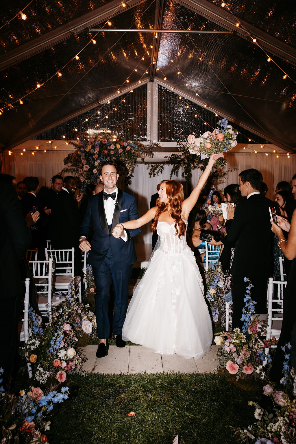 bride and groom walking down aisle