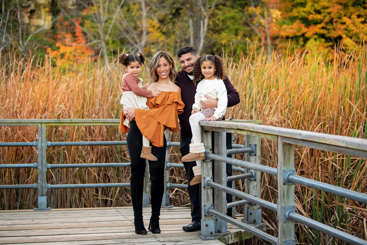 Burlington, Ontario fall family photos of a family with mom and dad and two daughters