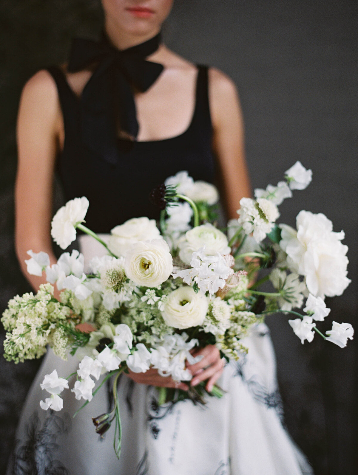 max-owens-design-black-white-modern-wedding-06-bouquet-ranunculus