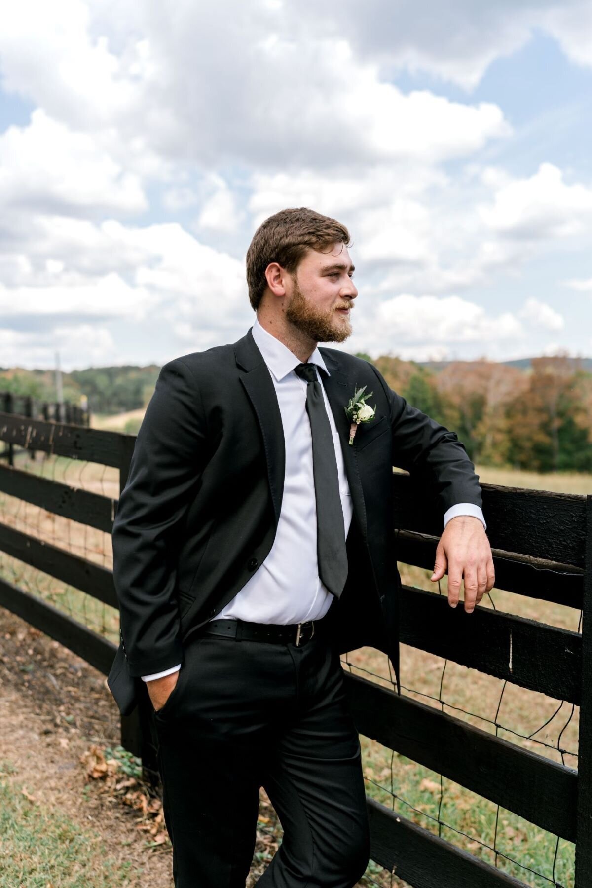 groom-overlooking-moutain-view-lewallen-farms-waleska-ga
