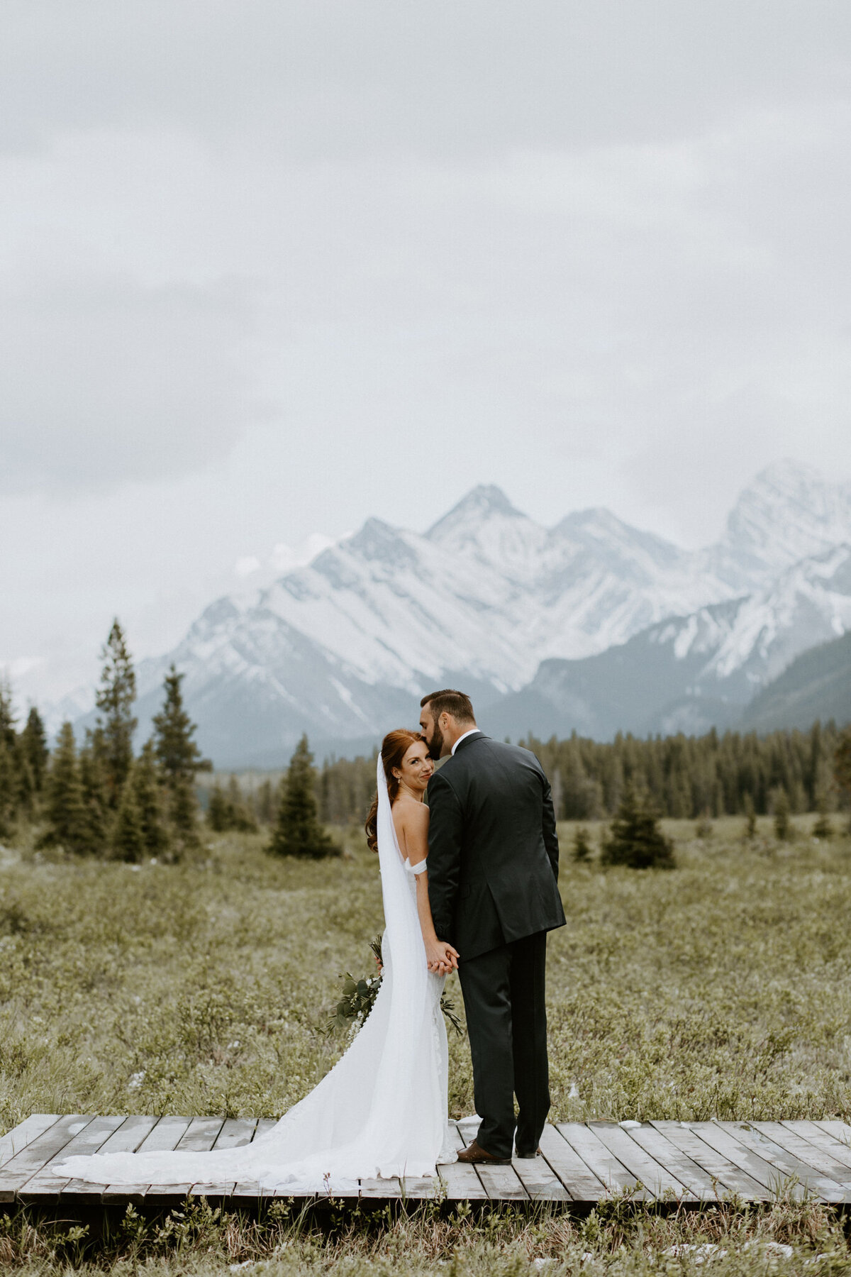 Elegant bride and groom portrait captured by Tim & Court Photo and Film, joyful and adventurous wedding photographer and videographer in Calgary, Alberta. Featured on the Bronte Bride Vendor Guide.