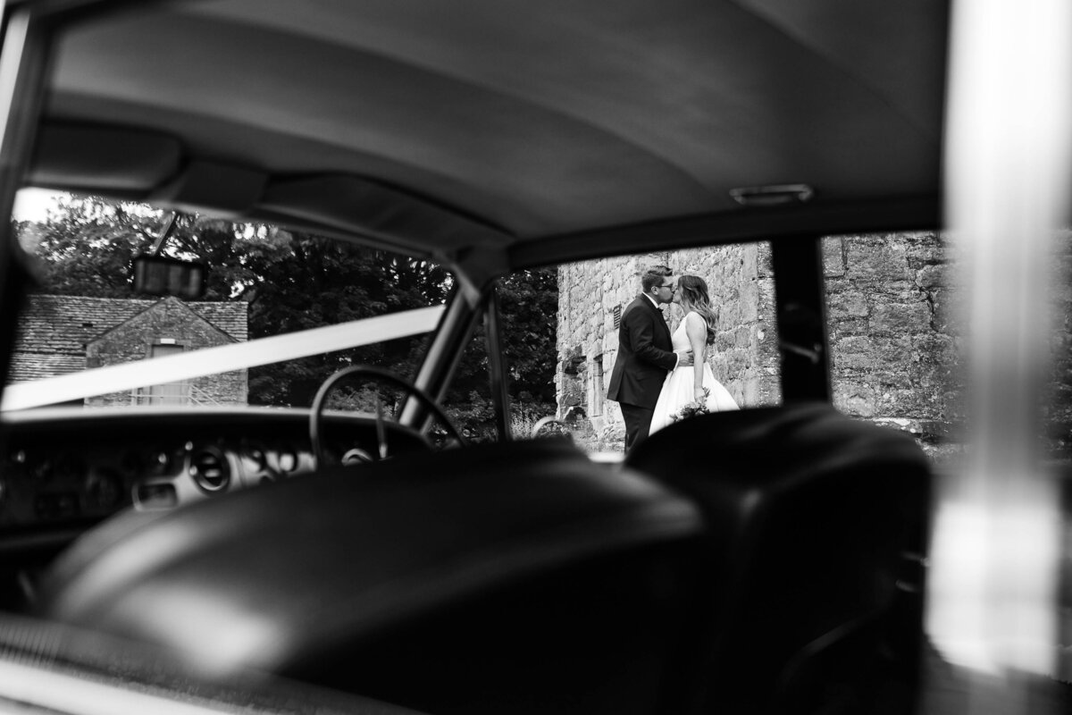 Photo of a couple kissing whilst waiting to go into Priests House, Bolton Abbey