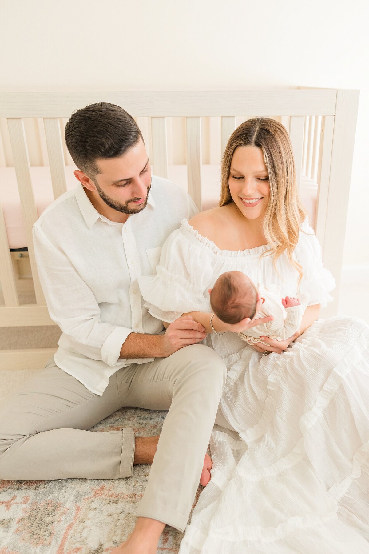 family lifestyle newborn session in nursery
