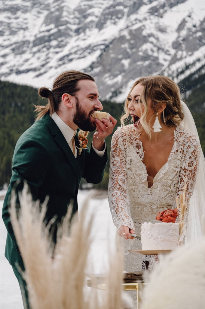Couple eating their wedding cake, created by Chartier YYC, elegant cakes & desserts in Calgary, AB, featured on the Brontë Bride Vendor Guide.