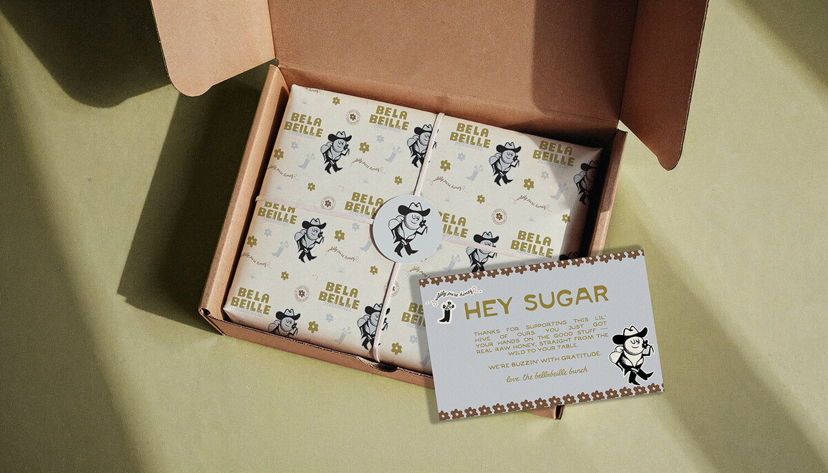 Wildspark crafted Belabeille’s logo, packaging, and brand identity to help female honey founders attract and retain loyal customers. Bold, southern-inspired design and cowgirl bee imagery create a vibrant, retail-ready brand presence.

Belabeille’s packaging, logo, and brand identity feature southern charm, playful cowgirl elements, and strategic CPG design. Every touchpoint was designed to elevate boutique honey brands and create a standout, professional retail experience.