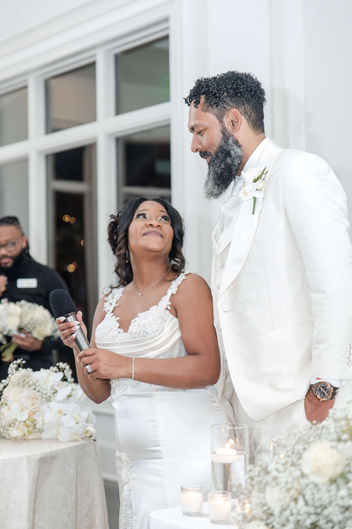The couple celebrates with a heartfelt toast, surrounded by family and friends.