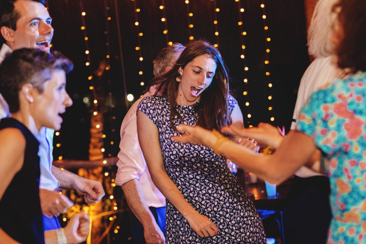 Guests dancing at wedding in Riviera Maya