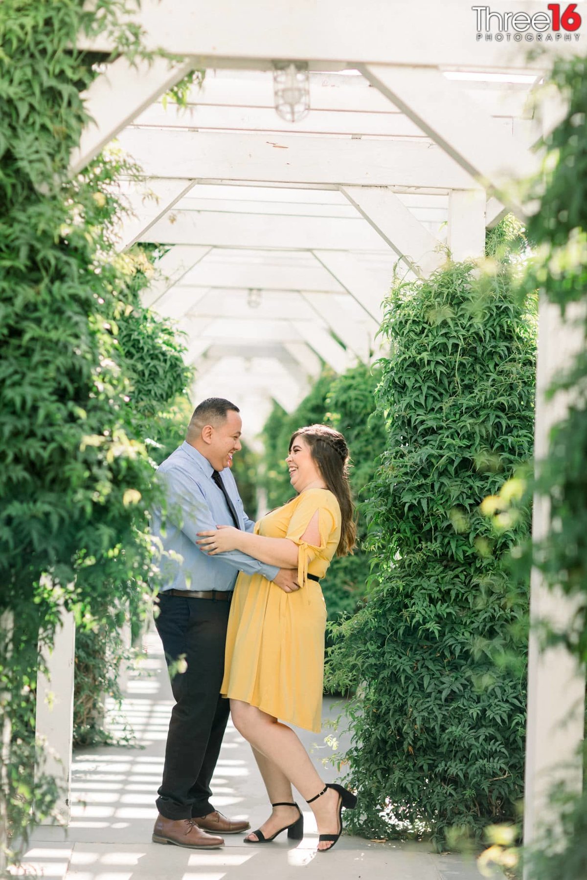 During embrace Groom to be makes his Bride laugh