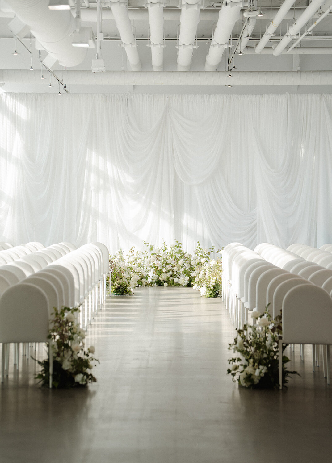 classic-white-floral-wedding-ceremony-science-center