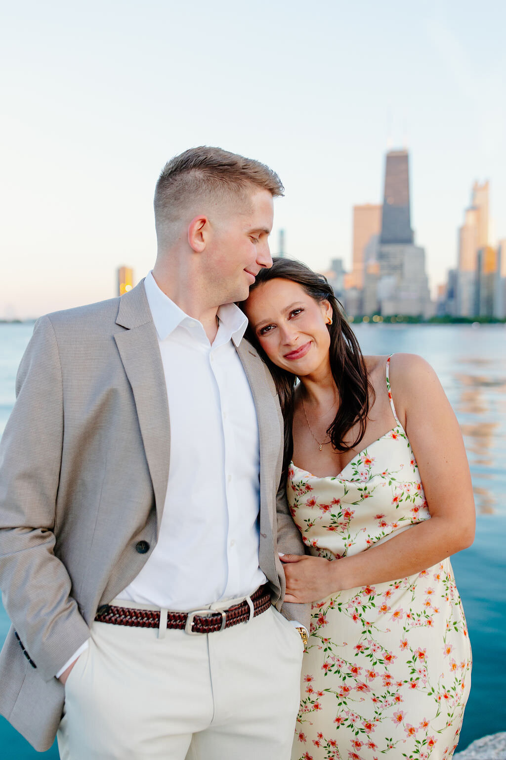 An engagement photography session at The Wrigley Building and North Ave Beach in Chicago, Illinois - 17
