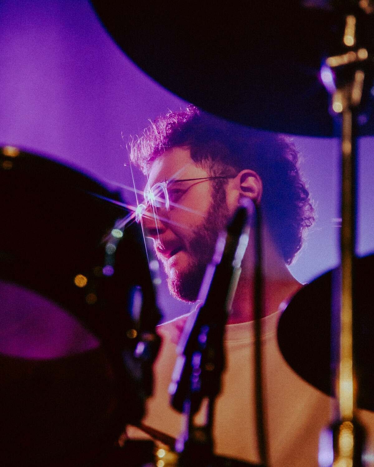 Drummer on stage wearing glasses at XOYO