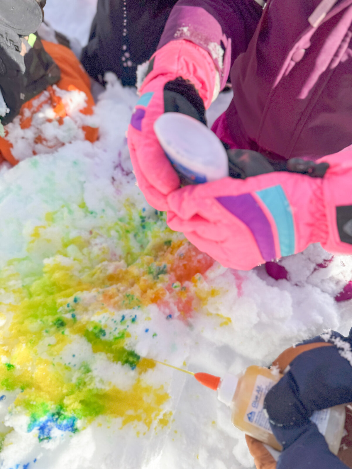 Students coloring snow on the playground at House of Parker Preschool Gorham Maine where we believe that play isn’t just something children do—it’s how they learn. Through play, children discover the world around them, express their creativity, build relationships, and develop the foundational skills they’ll carry with them for life.