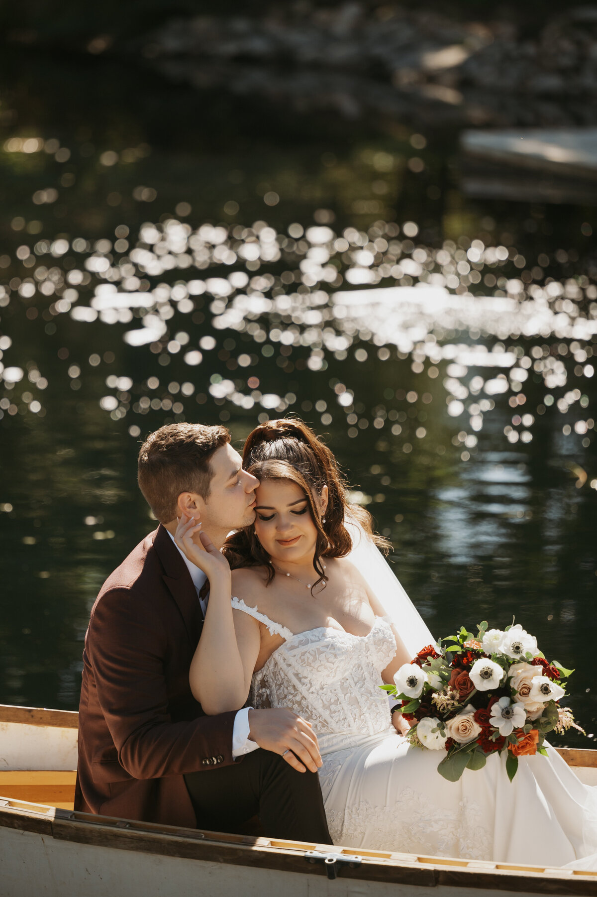 Close up photo of couple in canoe at Pine and Pond