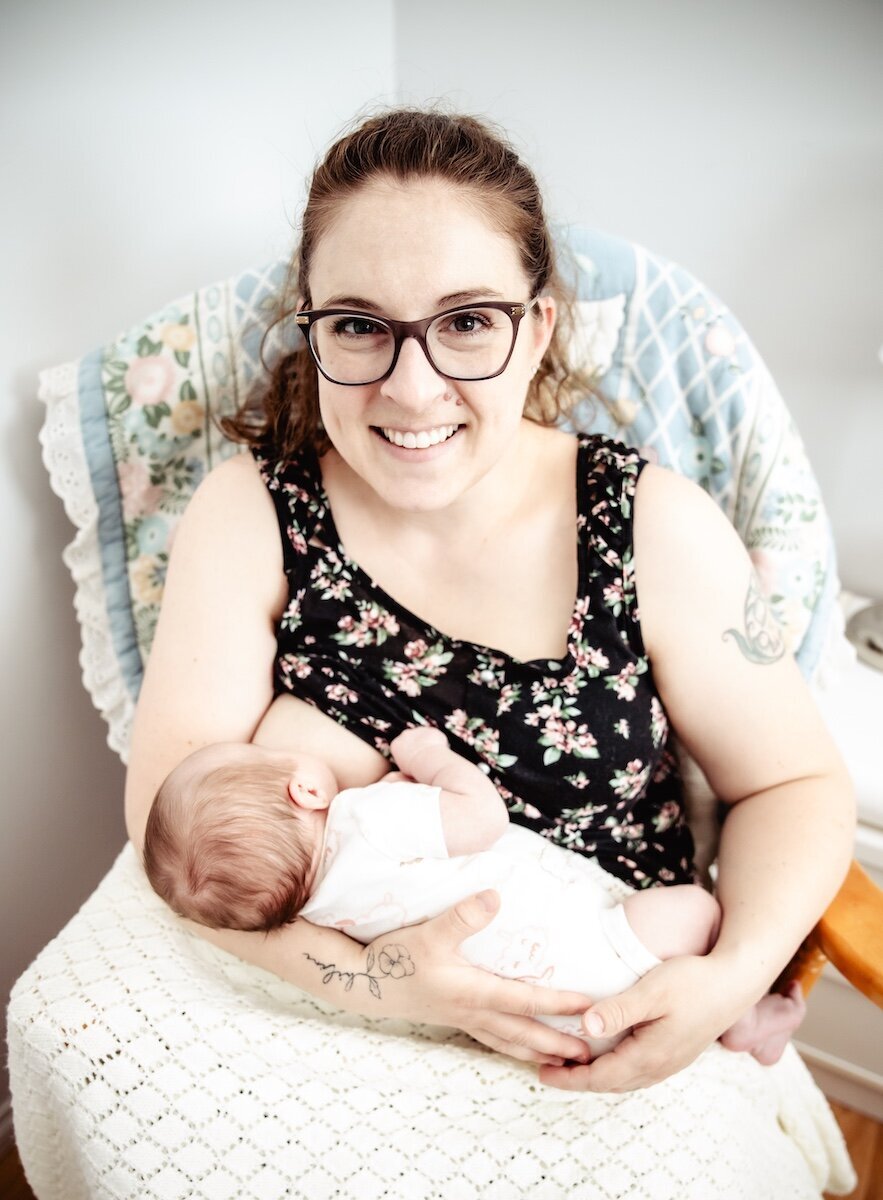 A new mom breastfeeds her two day old baby