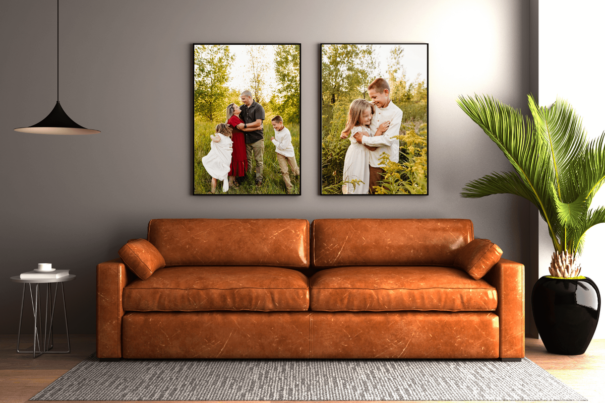 two images of a family photo session hanging on a wall above a leather sofa