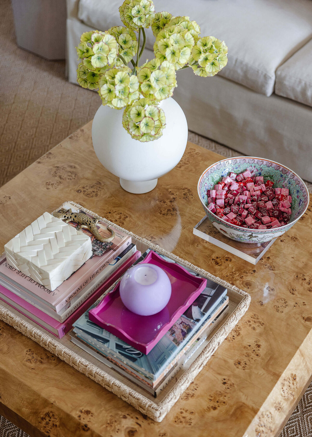 oyster creek studios aryns home flowers and books on a wooden coffee table
