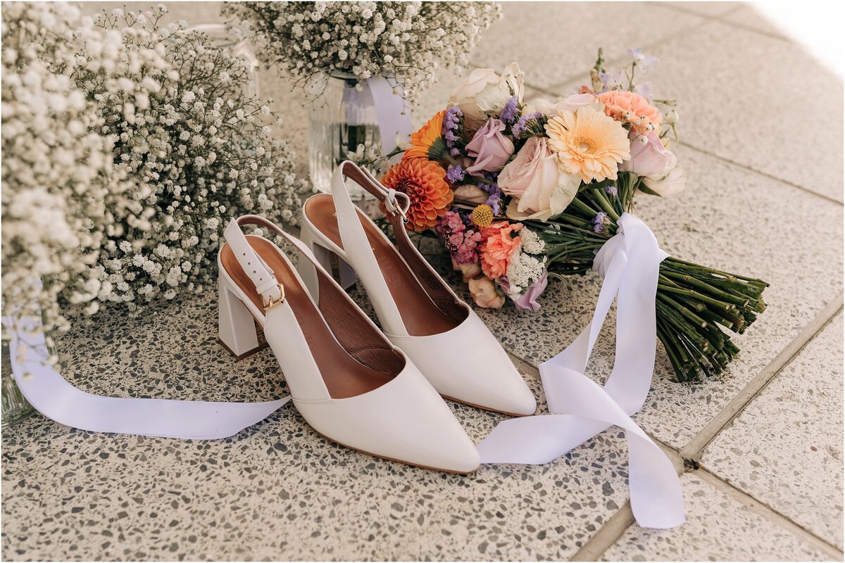 wedding details mi piaci shoes loving ellies belly pastel orange pink bouquet with white ribbon christchurch nz gypsophila