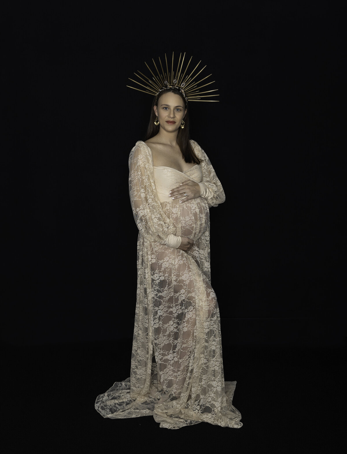PREGNANT LADY POSING IN LACE MATERNITY GOWN