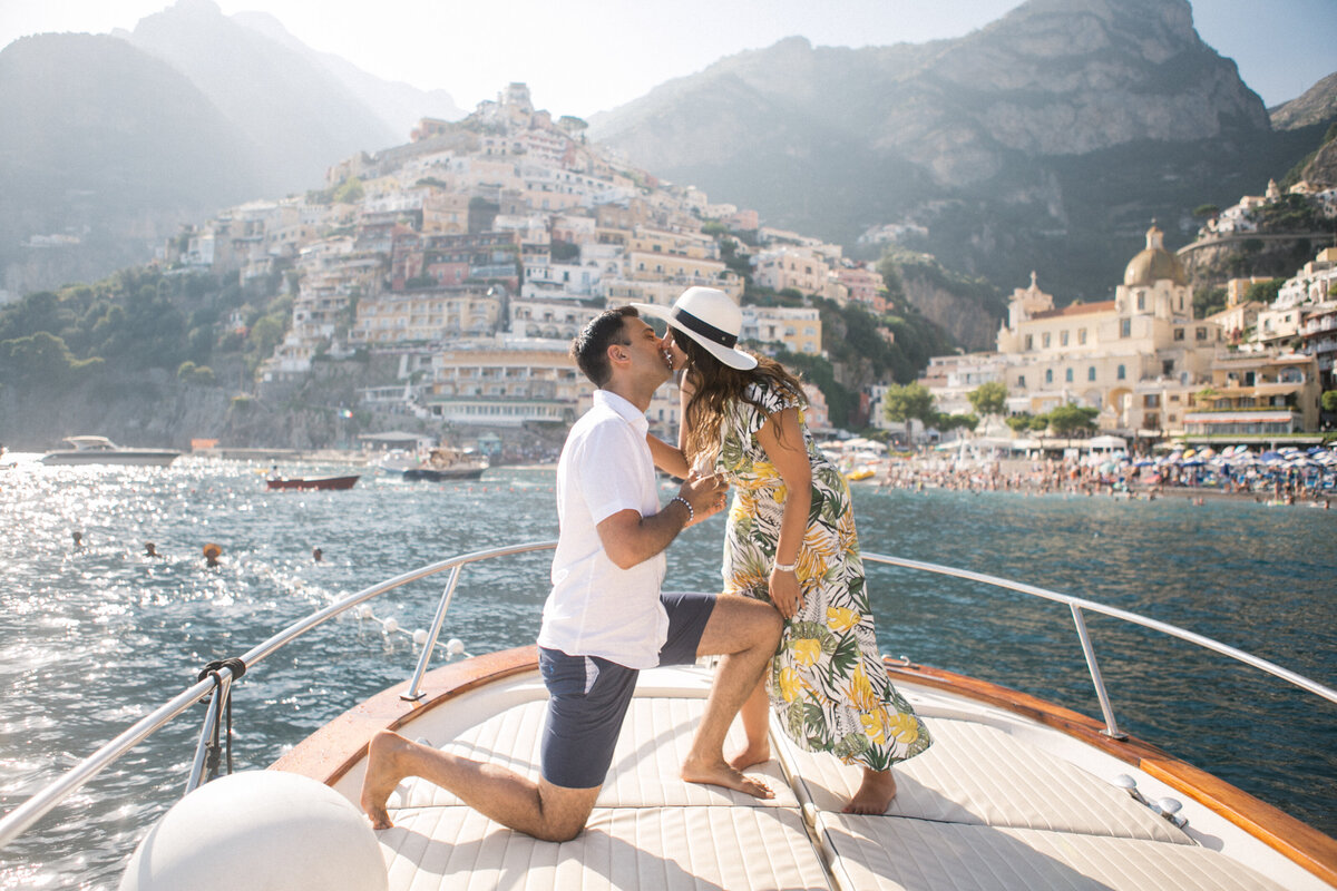 Romantic boat proposal in front of Positano – luxury Amalfi Coast engagement captured by Studio Rose