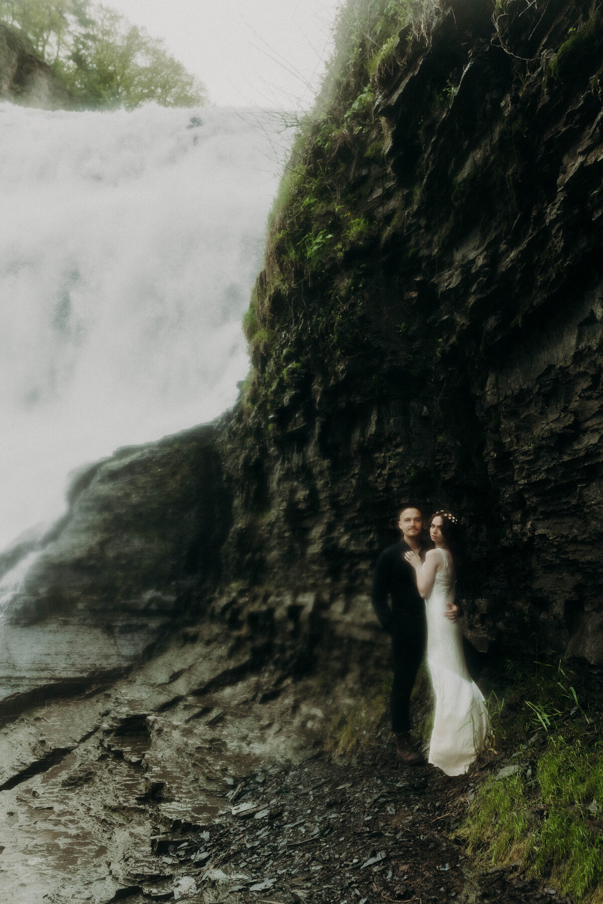 Waterfall elopement ethereal moody bride and groom photography destination photographer