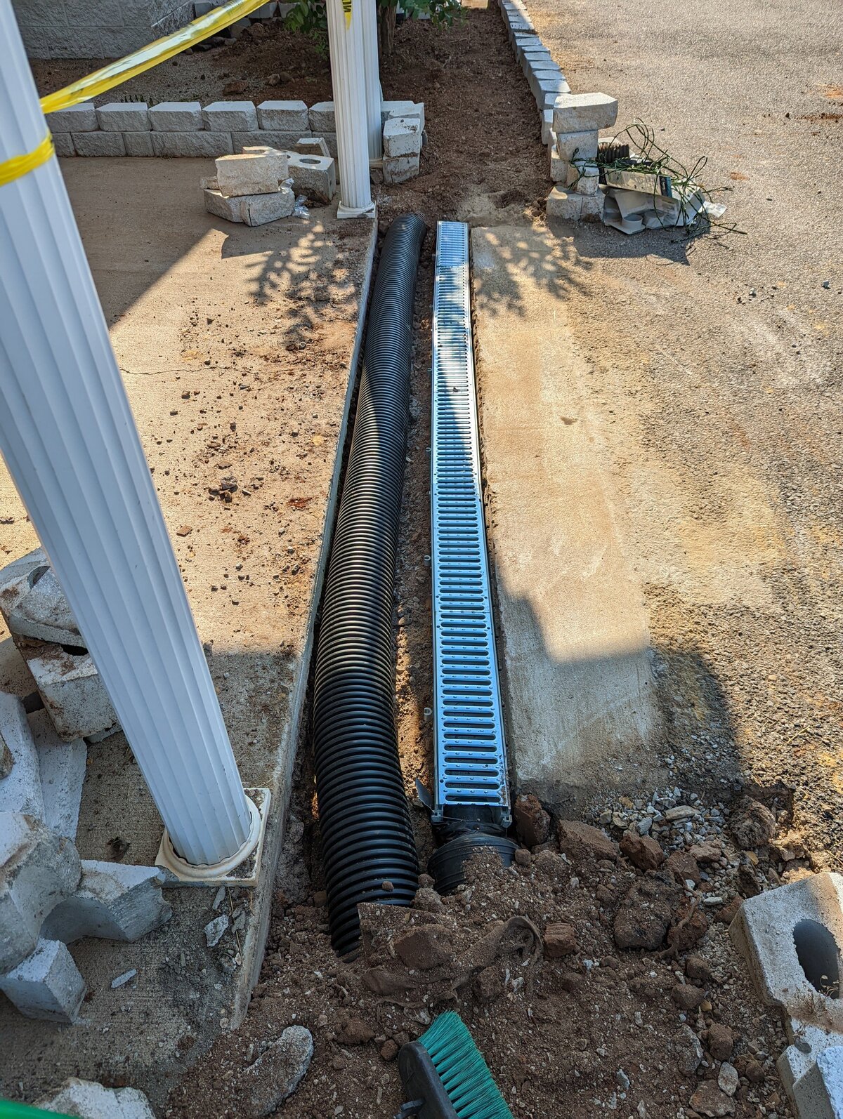 concrete-walkway-with-multiple-drains