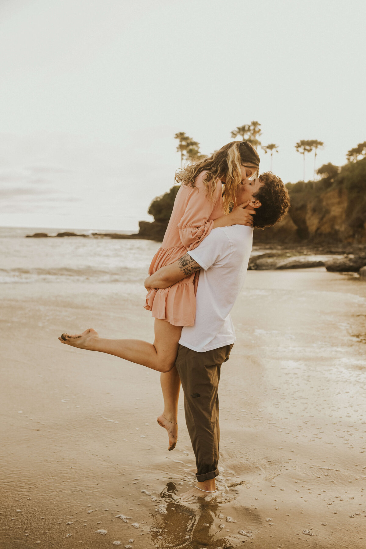 couple-kissing-poses-laguna-orange-county-photographer