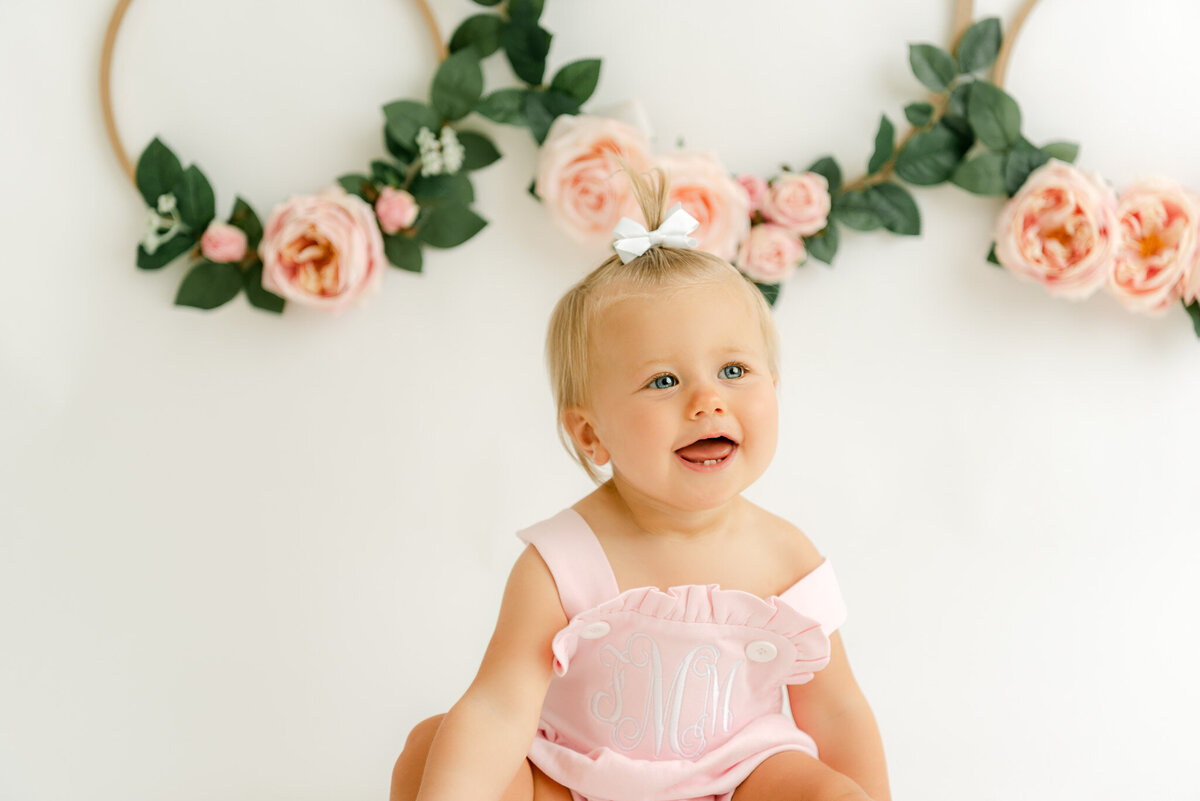 One year old first birthday milestone session pink and greens