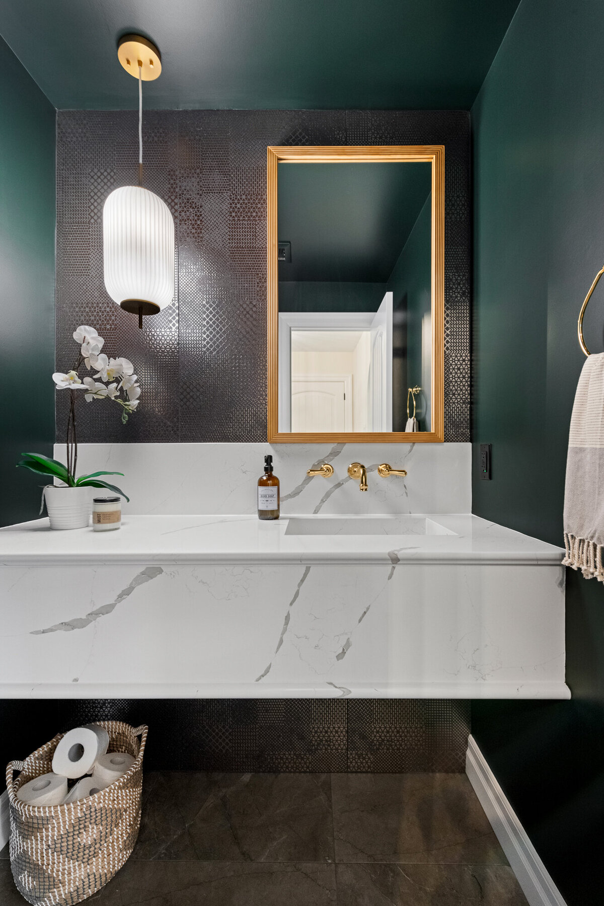Final image of our moody luxe powder room interior design project.