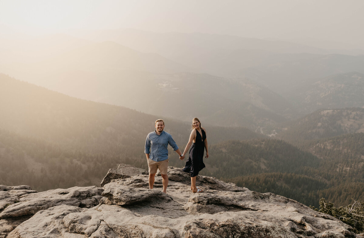 COuple holding hands in Boulder Colorado