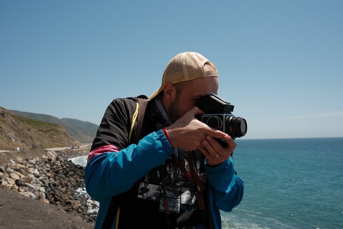 Photographer takes a photo of the ocean.
