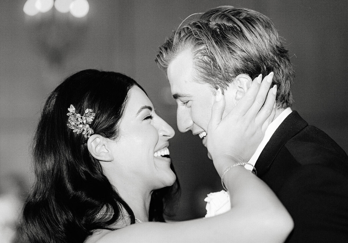 Bride & groom coming together for a reception shot.