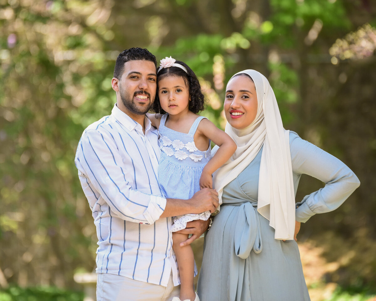 Muslim family portrait outdoors in park in Toronto
