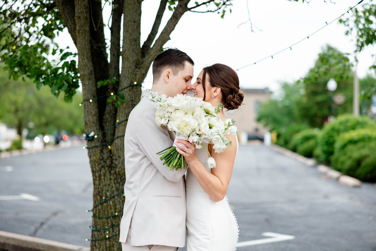 Romantic couples portraits captured by Style & Grace Photography on Main Street, St. Charles, MO, showcasing the newlyweds in the charming historic setting near St. Charles Foundry.