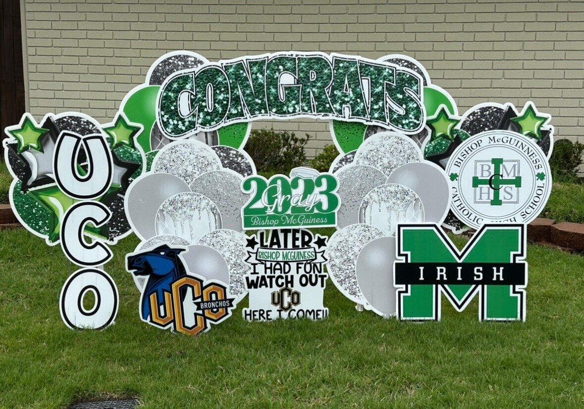 UCO and Bishop McGuinness Catholic High School Yard Sign Setup