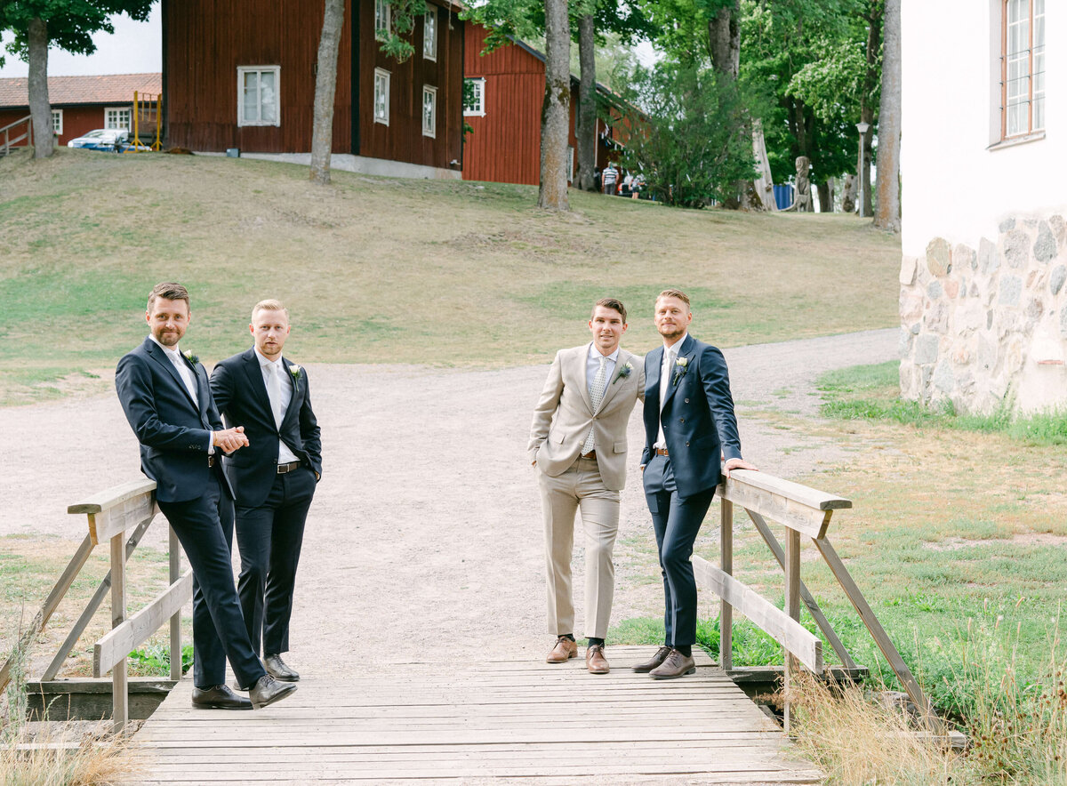 Wedding Photographer Stockholm helloalora groom and groomsmens outdoor garden wedding in Uppsala Sweden