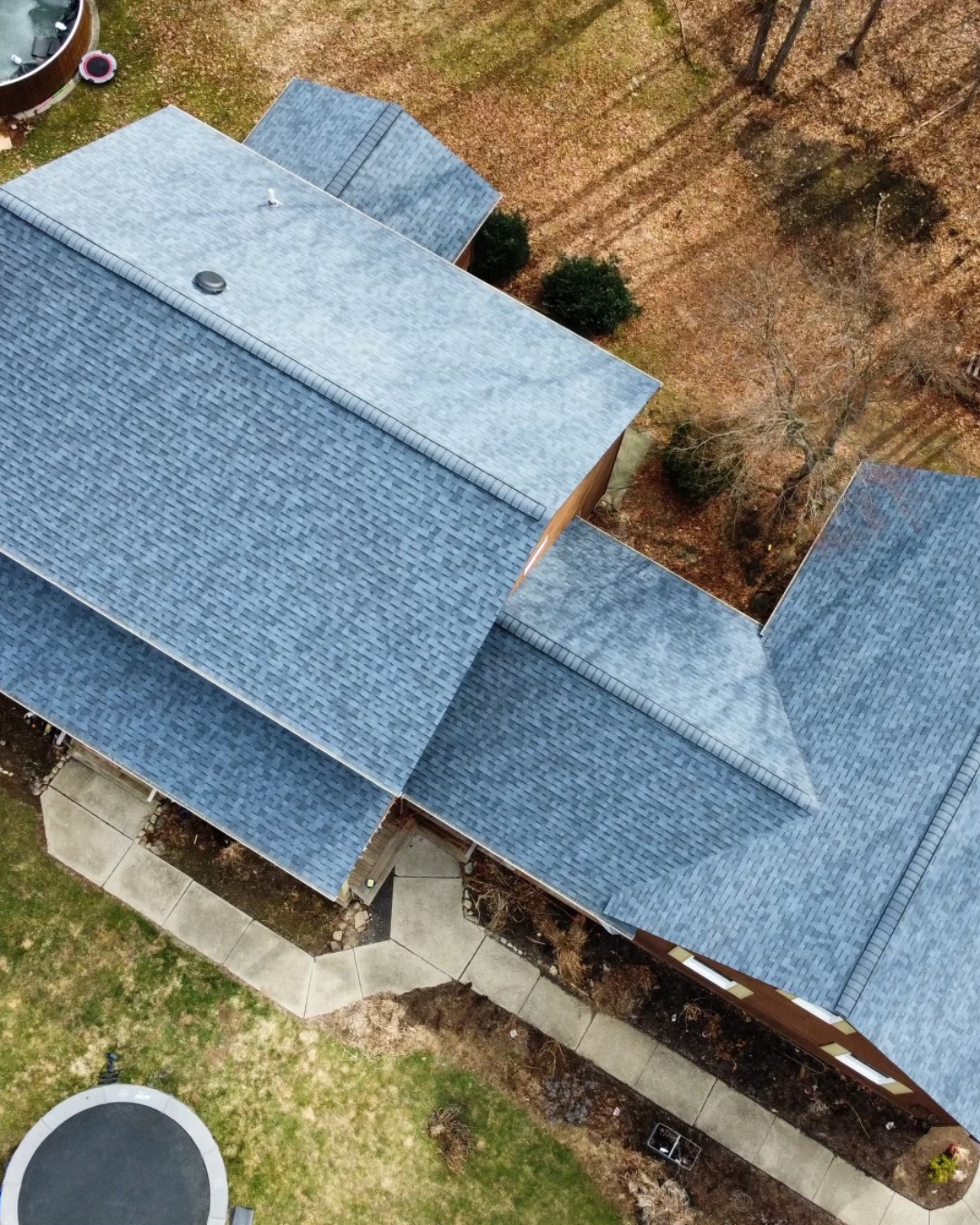 Aerial view of roof replacement with Owens Corning Harbor Blue Asphalt shingles